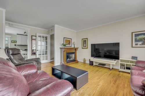 Salon - 8255 3E Avenue E., Québec (Charlesbourg), QC - Indoor Photo Showing Living Room With Fireplace