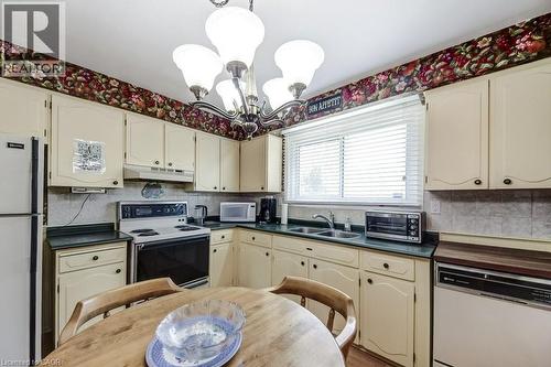 4356 Dublin Crescent, Burlington, ON - Indoor Photo Showing Kitchen With Double Sink