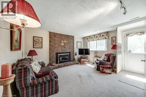 4356 Dublin Crescent, Burlington, ON - Indoor Photo Showing Living Room With Fireplace
