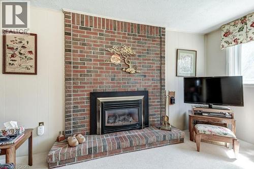 4356 Dublin Crescent, Burlington, ON - Indoor Photo Showing Living Room With Fireplace