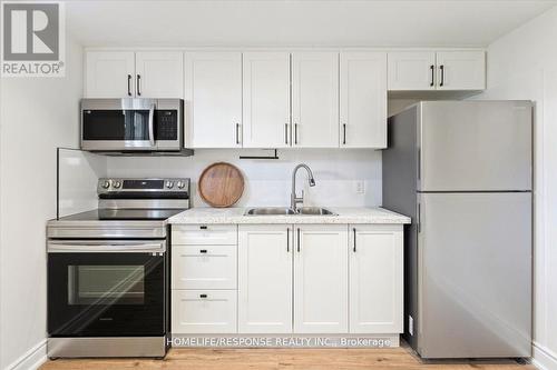 291 Thrace Avenue, Mississauga, ON - Indoor Photo Showing Kitchen With Double Sink