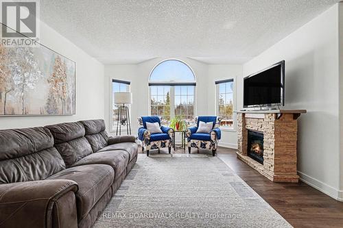 264 Ejs Lane, Beckwith, ON - Indoor Photo Showing Living Room With Fireplace