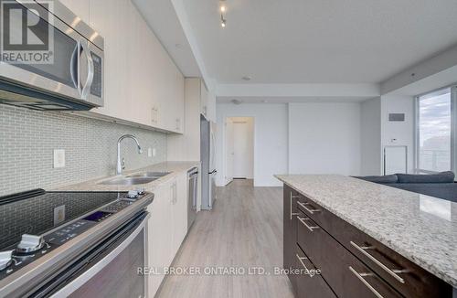 908 - 85 Duke Street W, Kitchener, ON - Indoor Photo Showing Kitchen With Double Sink With Upgraded Kitchen