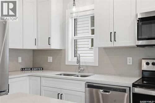 246 Aniskotaw Manor, Saskatoon, SK - Indoor Photo Showing Kitchen With Double Sink