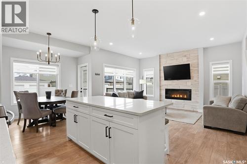 246 Aniskotaw Manor, Saskatoon, SK - Indoor Photo Showing Living Room With Fireplace