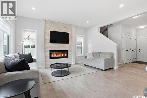 246 Aniskotaw Manor, Saskatoon, SK - Indoor Photo Showing Living Room With Fireplace