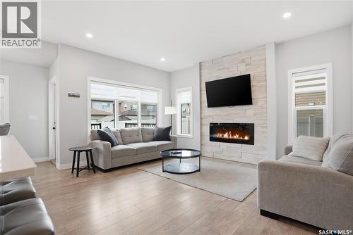 246 Aniskotaw Manor, Saskatoon, SK - Indoor Photo Showing Living Room With Fireplace