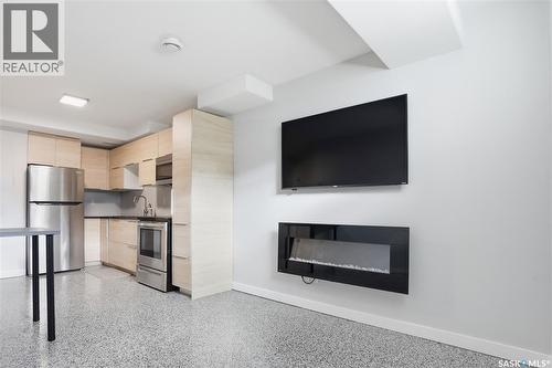 246 Aniskotaw Manor, Saskatoon, SK - Indoor With Fireplace