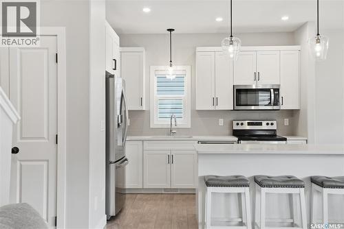 246 Aniskotaw Manor, Saskatoon, SK - Indoor Photo Showing Kitchen With Stainless Steel Kitchen With Upgraded Kitchen
