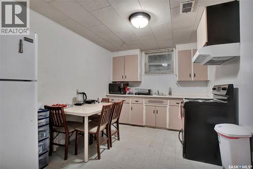 1328 Main Street, Saskatoon, SK - Indoor Photo Showing Kitchen With Double Sink