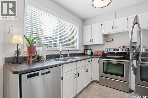 16 425 Pinehouse Drive, Saskatoon, SK - Indoor Photo Showing Kitchen With Double Sink