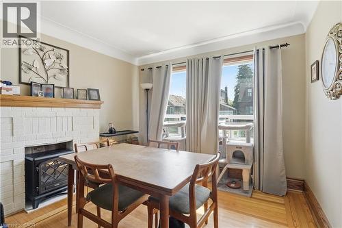 21 Weir Street N, Hamilton, ON - Indoor Photo Showing Dining Room With Fireplace