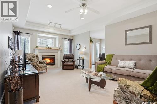 911 Chotem Crescent, Saskatoon, SK - Indoor Photo Showing Living Room With Fireplace