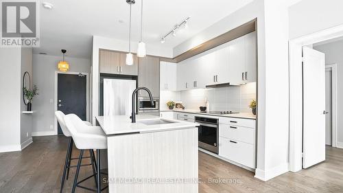 415 - 1575 Lakeshore Road W, Mississauga, ON - Indoor Photo Showing Kitchen With Upgraded Kitchen