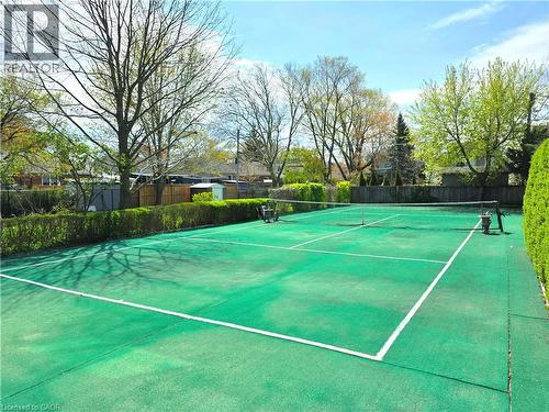 Imagine owning a tennis court in your backyard! - 16 Forest Hill Road, St. Catharines, ON - Outdoor With Backyard
