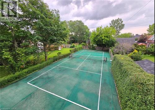 Enjoy watching some tennis from the balcony - 16 Forest Hill Road, St. Catharines, ON - Outdoor With Backyard