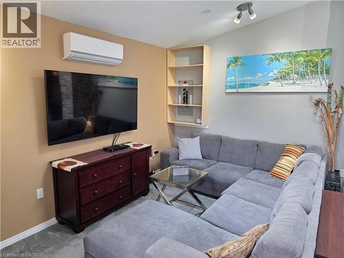 Comfy feel with built-in shelving - 16 Forest Hill Road, St. Catharines, ON - Indoor Photo Showing Living Room