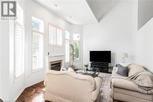 102 Moore Crescent, Ancaster, ON - Indoor Photo Showing Living Room With Fireplace