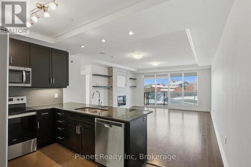 501 - 150 Wellington Street E, Guelph (Downtown), ON - Indoor Photo Showing Kitchen With Double Sink With Upgraded Kitchen