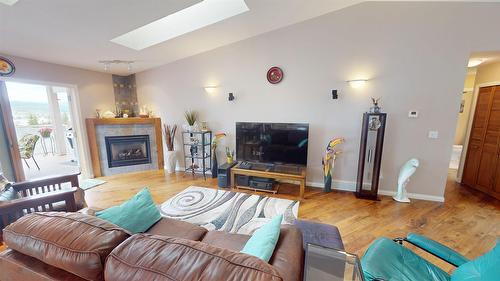 3333 Mt Fisher Drive, Cranbrook, BC - Indoor Photo Showing Living Room With Fireplace