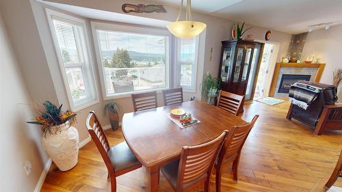 3333 Mt Fisher Drive, Cranbrook, BC - Indoor Photo Showing Dining Room With Fireplace