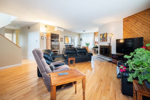 Living Room - 1869 Rue De Livourne, Laval (Vimont), QC - Indoor Photo Showing Living Room With Fireplace