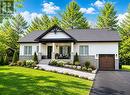 99 Tall Pines Drive, Tiny, ON  - Outdoor With Facade 