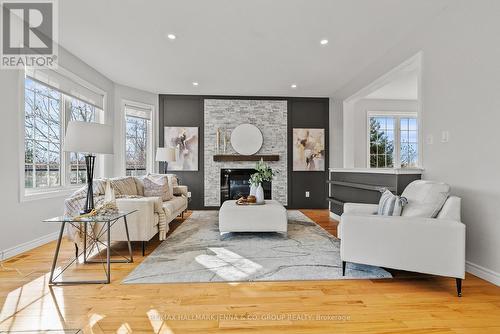 2649 Fallingwater Circle, Ottawa, ON - Indoor Photo Showing Living Room With Fireplace