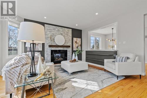 2649 Fallingwater Circle, Ottawa, ON - Indoor Photo Showing Living Room With Fireplace