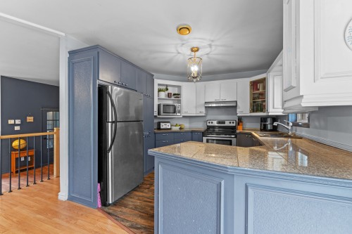 Kitchen - 42 Rue Xavier, Saint-Lin/Laurentides, QC - Indoor Photo Showing Kitchen With Double Sink