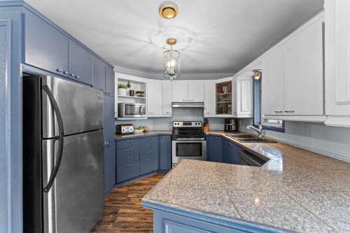 Kitchen - 42 Rue Xavier, Saint-Lin/Laurentides, QC - Indoor Photo Showing Kitchen With Double Sink