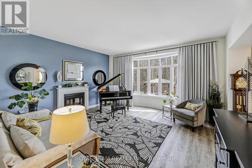25 Thompson Way, Springwater, ON - Indoor Photo Showing Living Room With Fireplace