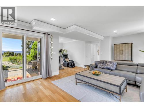 Family/exercise  room with a covered patio - 4325 Takla Road, Kelowna, BC 