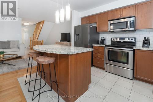 25 - 233 Duskywing Way, Oakville, ON - Indoor Photo Showing Kitchen With Stainless Steel Kitchen