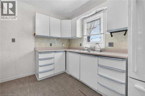 227 West 19Th Street, Hamilton, ON - Indoor Photo Showing Kitchen With Double Sink