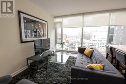 Living Room w/Hardwood & Floor-to-Ceiling Windows - 