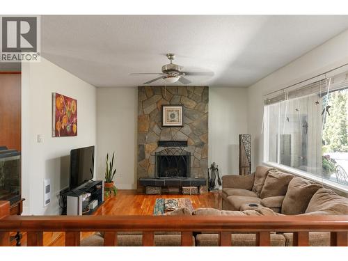 2351 Gallagher Road, Kelowna, BC - Indoor Photo Showing Living Room With Fireplace