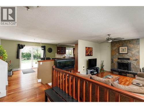 2351 Gallagher Road, Kelowna, BC - Indoor Photo Showing Living Room With Fireplace