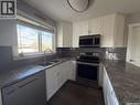 302 Aberdeen Street, Elbow, SK  - Indoor Photo Showing Kitchen With Double Sink 