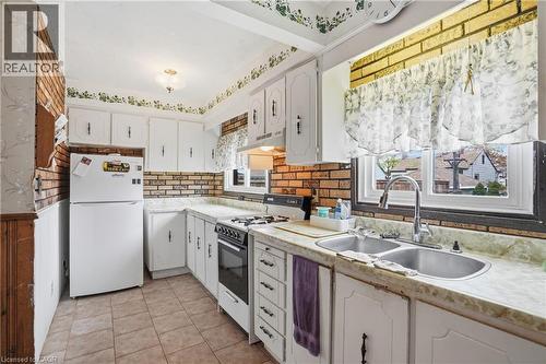 105 Tolton Avenue, Hamilton, ON - Indoor Photo Showing Kitchen With Double Sink