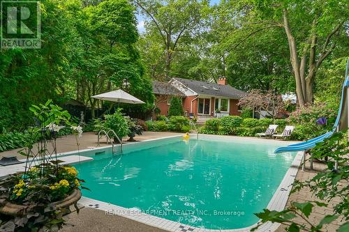 1373 Queen Victoria Avenue, Mississauga, ON - Outdoor With In Ground Pool