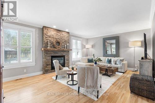 32 Feldspar Crescent, Ottawa, ON - Indoor Photo Showing Living Room With Fireplace