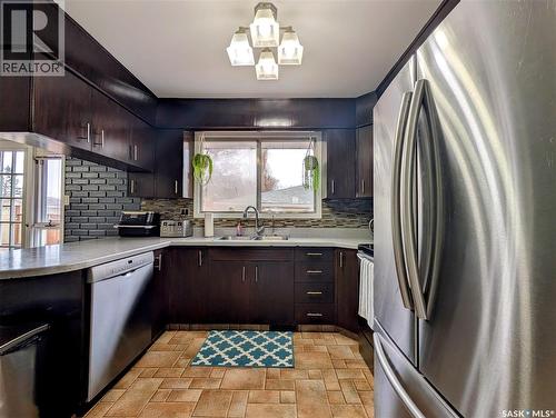 24 Dryburgh Crescent, Regina, SK - Indoor Photo Showing Kitchen With Double Sink With Upgraded Kitchen