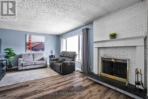 1427 Rosebella Avenue, Ottawa, ON - Indoor Photo Showing Living Room With Fireplace