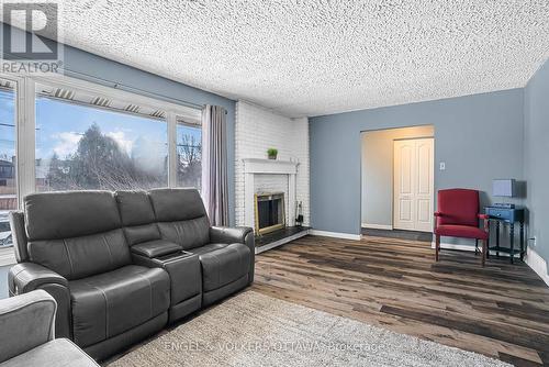 1427 Rosebella Avenue, Ottawa, ON - Indoor Photo Showing Living Room With Fireplace