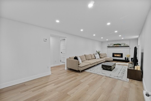 Salle familiale - 523 7E Avenue, Saint-Jérôme, QC - Indoor Photo Showing Other Room With Fireplace