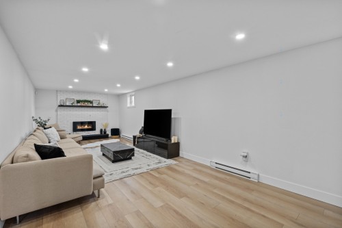 Salle familiale - 523 7E Avenue, Saint-Jérôme, QC - Indoor Photo Showing Living Room With Fireplace