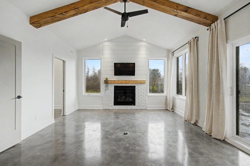 Salon - 73 Rue Dumont, Lac-Brome, QC - Indoor Photo Showing Other Room With Fireplace