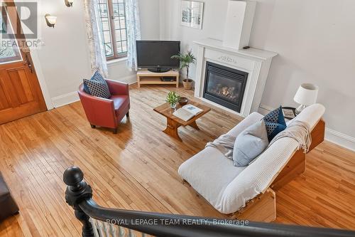 60 - 58 St Andrew Street, Ottawa, ON - Indoor Photo Showing Living Room With Fireplace