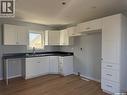414 3Rd Avenue, Dodsland, SK  - Indoor Photo Showing Kitchen With Double Sink 